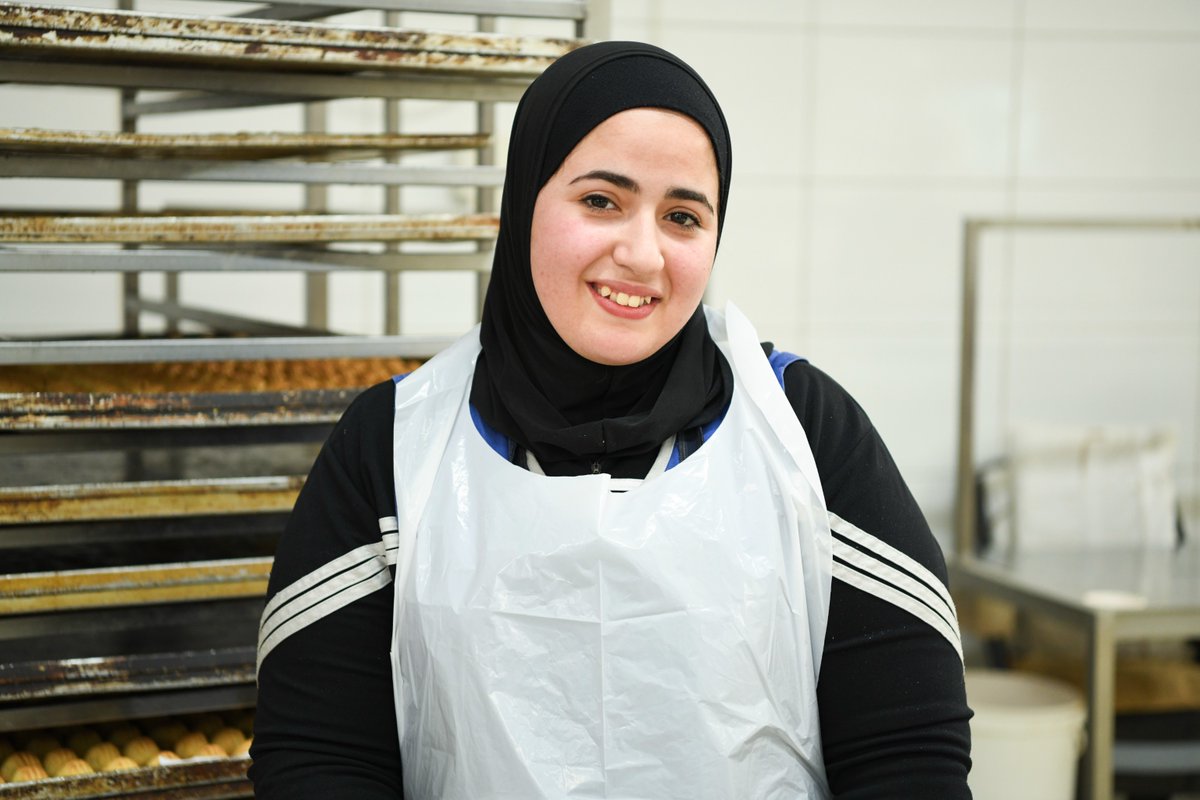 UNICEFJordan's tweet photo. “It wasn't easy finding a job. Once I did, my life changed.” 

Sahar, 22, is employed at a sweets factory through the @UNICEF-supported On-The-Job training programme -providing vulnerable youth with first-hand experience &amp; increasing their chances of employment. #Learning2Earning https://t.co/Qv7ycoqRIz