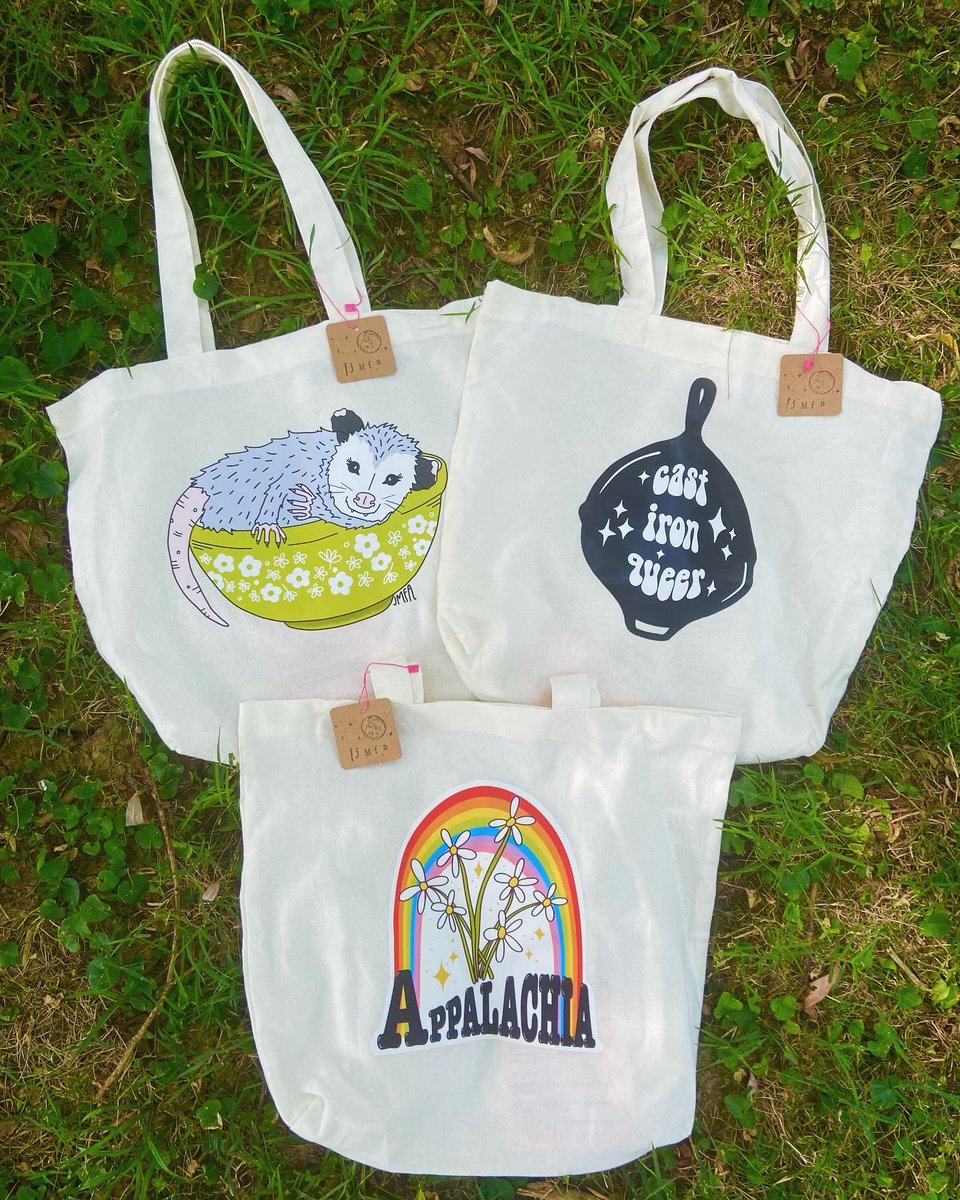 JuniperMoonKY's tweet photo. Alright boys, mama needs a new printer and to pay for a mammogram in a few days. Head over to our IG to buy one of these bags and help us make some $$! Only 3 of each available and you get a FREE cowboy possum pin when you buy one 🌈💘✨ https://t.co/BczlX9xDZ3