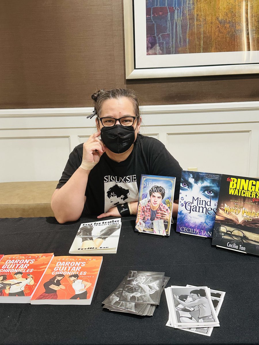 ceciliatan's tweet photo. I completely forgot to share this pic of myself autographing at #Readercon that Meg Elison took 💕 https://t.co/i5Mn6pyhIv