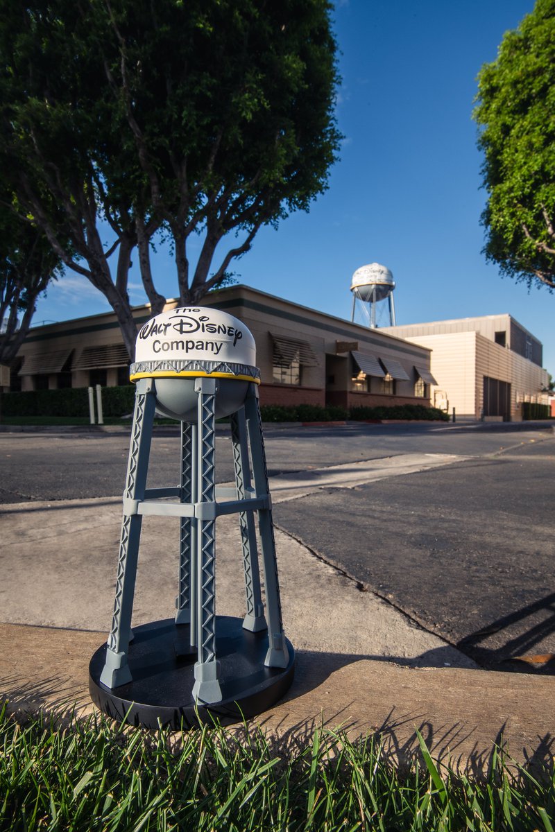 ScottGustin's tweet photo. At D23: The Ultimate Disney Fan Event, The Walt Disney Company Store will make its debut and will feature collectible figurines of locations across the Disney lot including Partners Statue, Sharing the Magic Statue, Pluto’s Corner Sign, and Water Tower. #D23Expo https://t.co/fTCEOBvWso