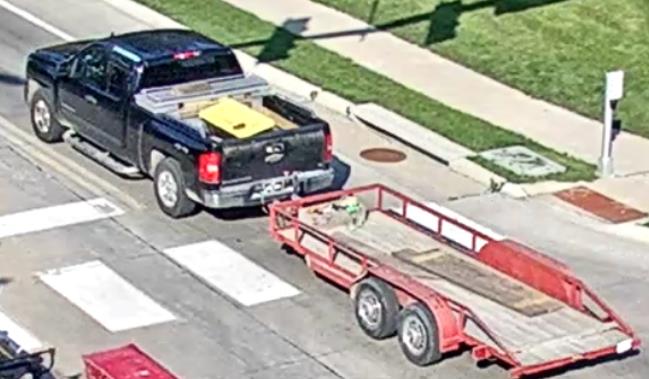 LinnIASheriff's tweet photo. News Release: Attempt to identify suspect from hit &amp; run on July 11, 2024. The suspect was driving a black Chevy Silverado 1500 &amp; pulling a red tandem axle utility trailer. If you have information on the owner or driver of this vehicle, please call 319-892-6215. https://t.co/ppbLyiiB5p