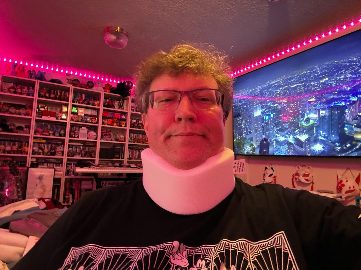 tekitsune's tweet photo. I've been paroled! 

It's not a cone-of-shame at least. Fortunately, I only have to wear it around if I'm walking. Good to be back home from my short overnight stay at the hospital. Recovery time!

#OutOfTheHospital #LiteralPainInTheNeck #PainPainGoAway