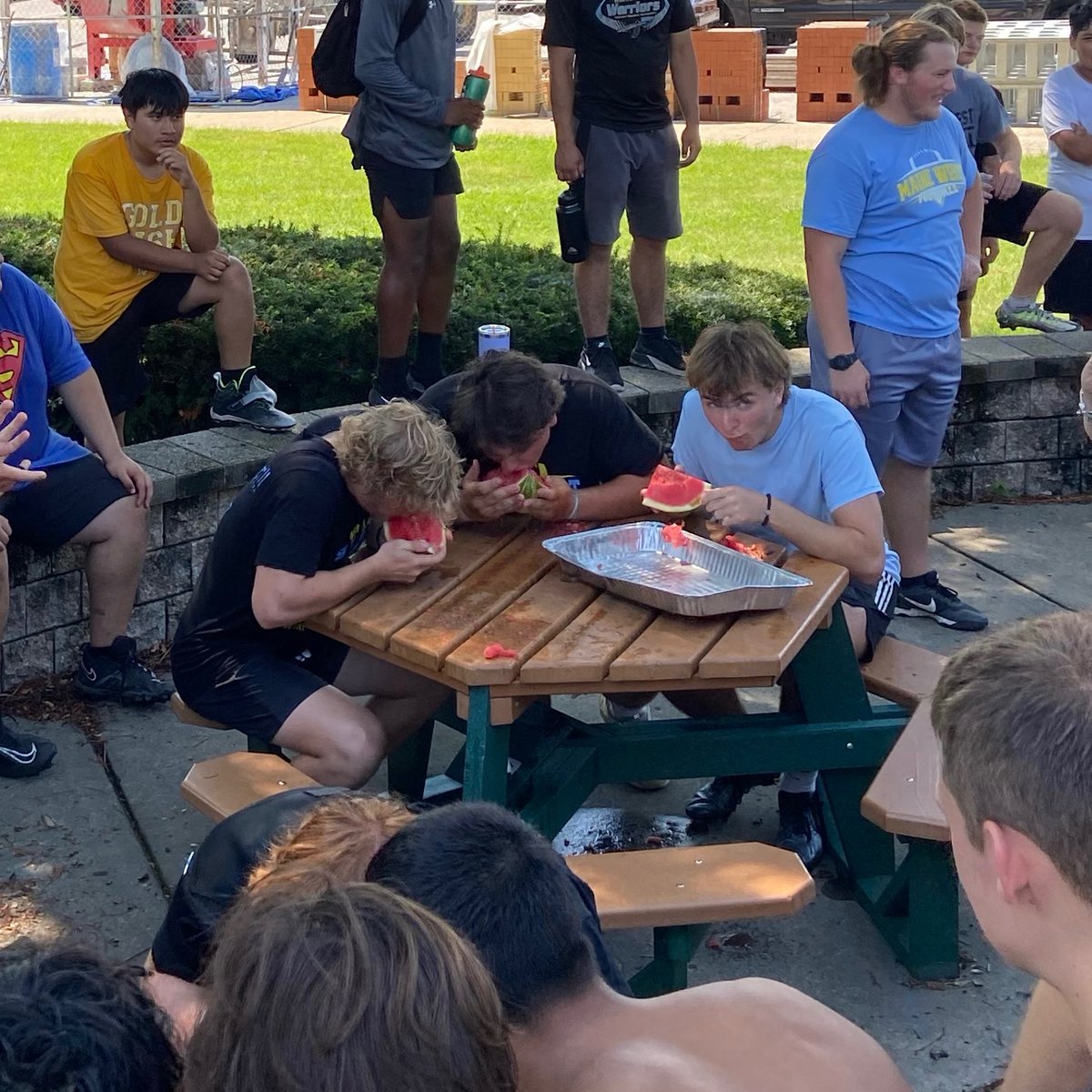 MaineWestFtbl's tweet photo. Congrats to the #TEAM65 🍉 Champs! Brody Kroschel is the overall winner. Lucas Masek and Lukasz Kleszcz were our respective Junior and F/S champs. Thx to our parent volunteers for slicing  the food. Camp at West went great. Now we head to Augustana College for team camp. #LetsEAT https://t.co/3gYVaK2rZT