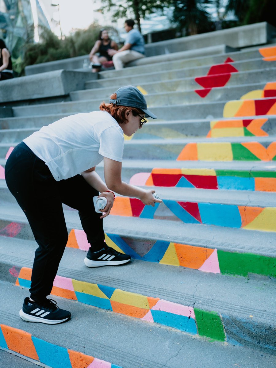 southlakeunion's tweet photo. The stairs at Day 1 Playfield and Van Vorst Plaza are now adorned with stunning chalk art by #UrbanArtWorks! 🎨✨ Come check out these vibrant masterpieces and snap some pics. https://t.co/w8j01ZZZxq #SummerInSLU #PhotoOp #SummerGames #SummerInSLUGameOn #PublicArt https://t.co/Gq51JWTwoT