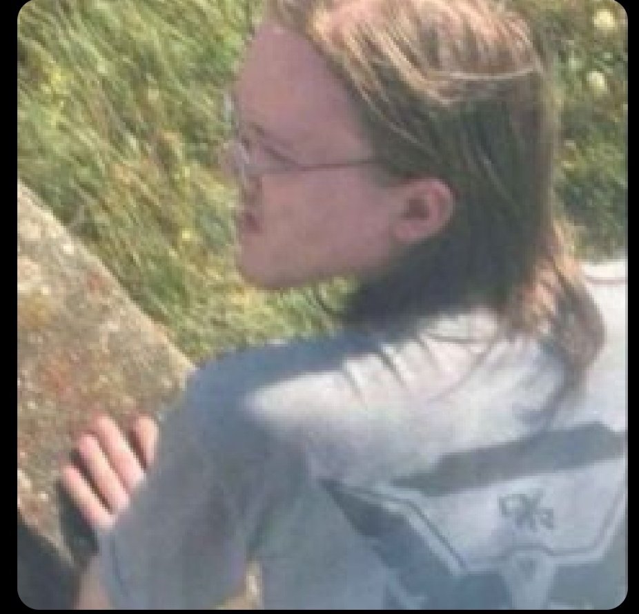 NMP562's tweet image. Im hearing this is not a drone pic, but a screen grab from cctv footage from a camera that was above the backdoor of building. 

It was taken while he was sitting on this barrier wall.