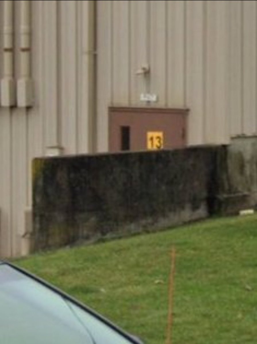 NMP562's tweet image. Im hearing this is not a drone pic, but a screen grab from cctv footage from a camera that was above the backdoor of building. 

It was taken while he was sitting on this barrier wall.