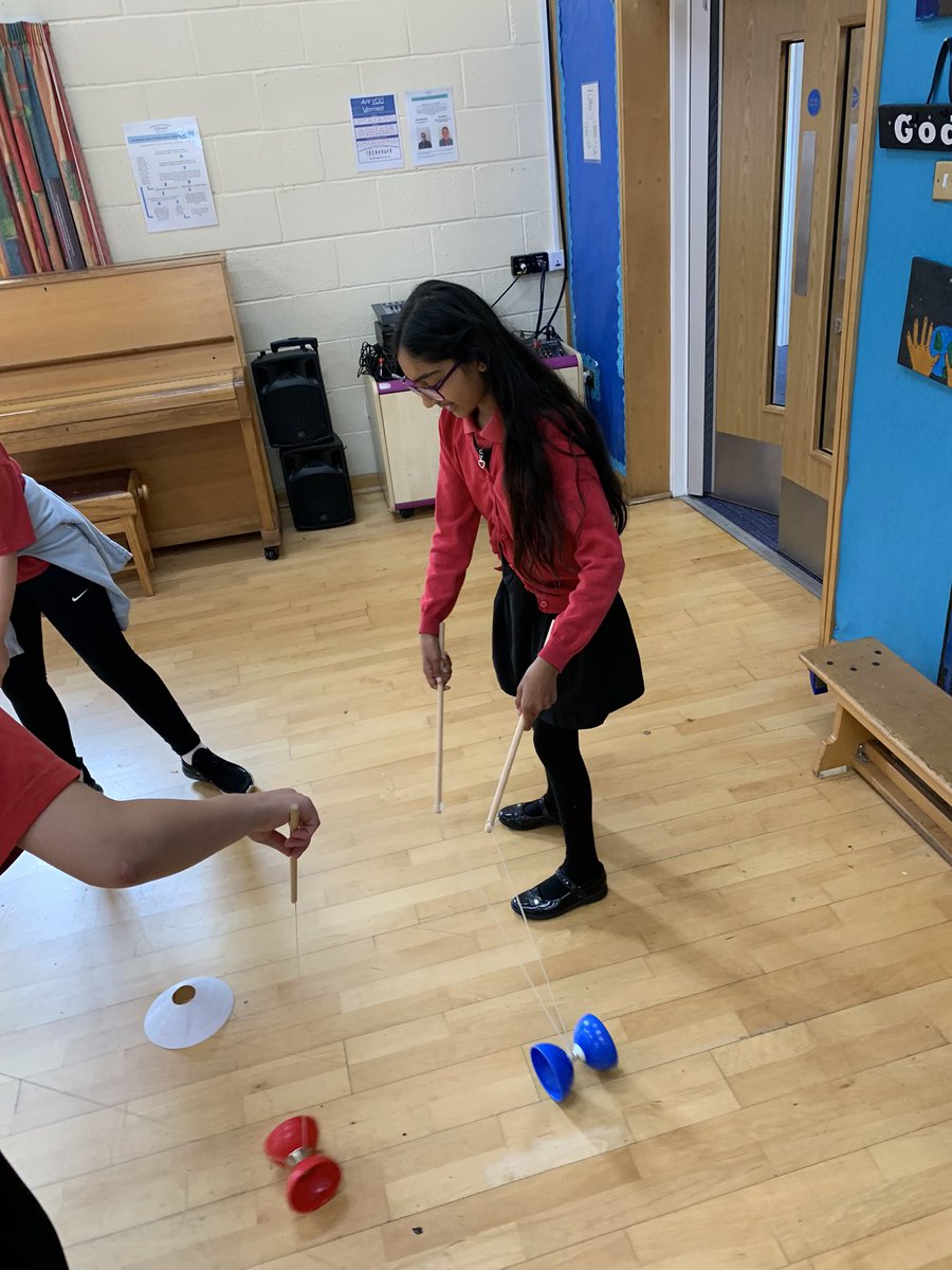 Performing circus skills with Mr Watson.