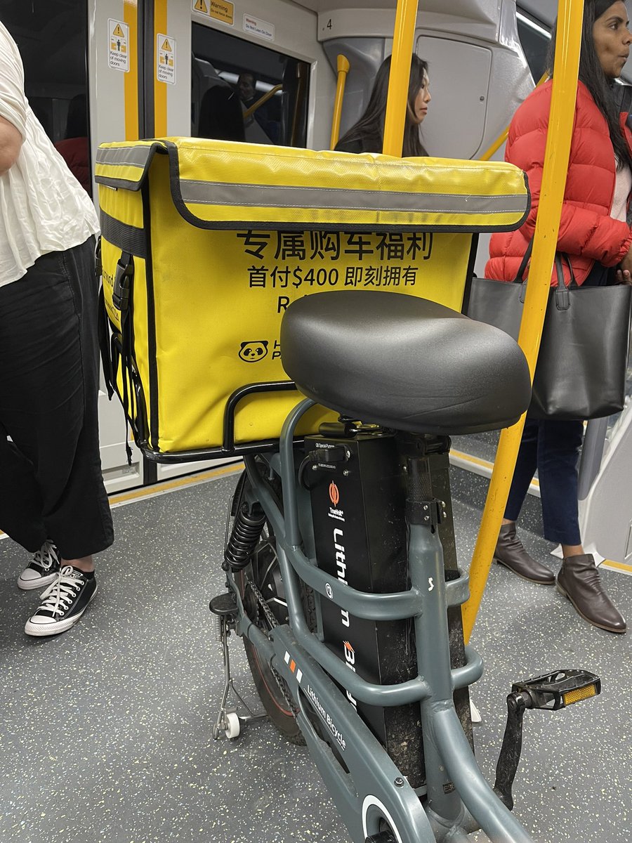 EnabledCooking's tweet photo. @NSWTransportQQ why are big courier e-bikes allowed on sydney trains? Blocking access to disability seating and making boarding and exiting very difficult! https://t.co/NptafQQOvH