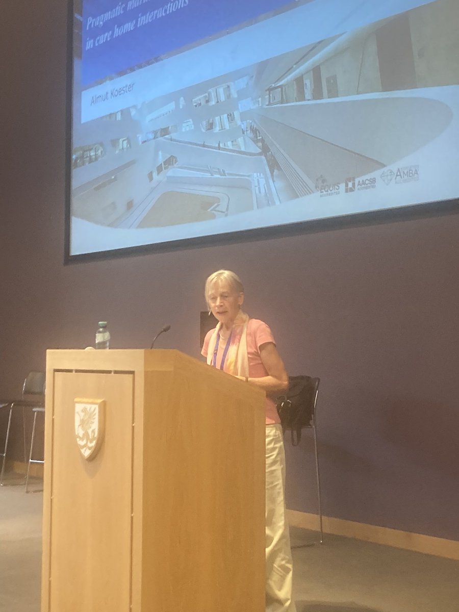 Almut Köster delivering her paper on Pragmatic markers and professional practice in care home interactions #ivacs2024