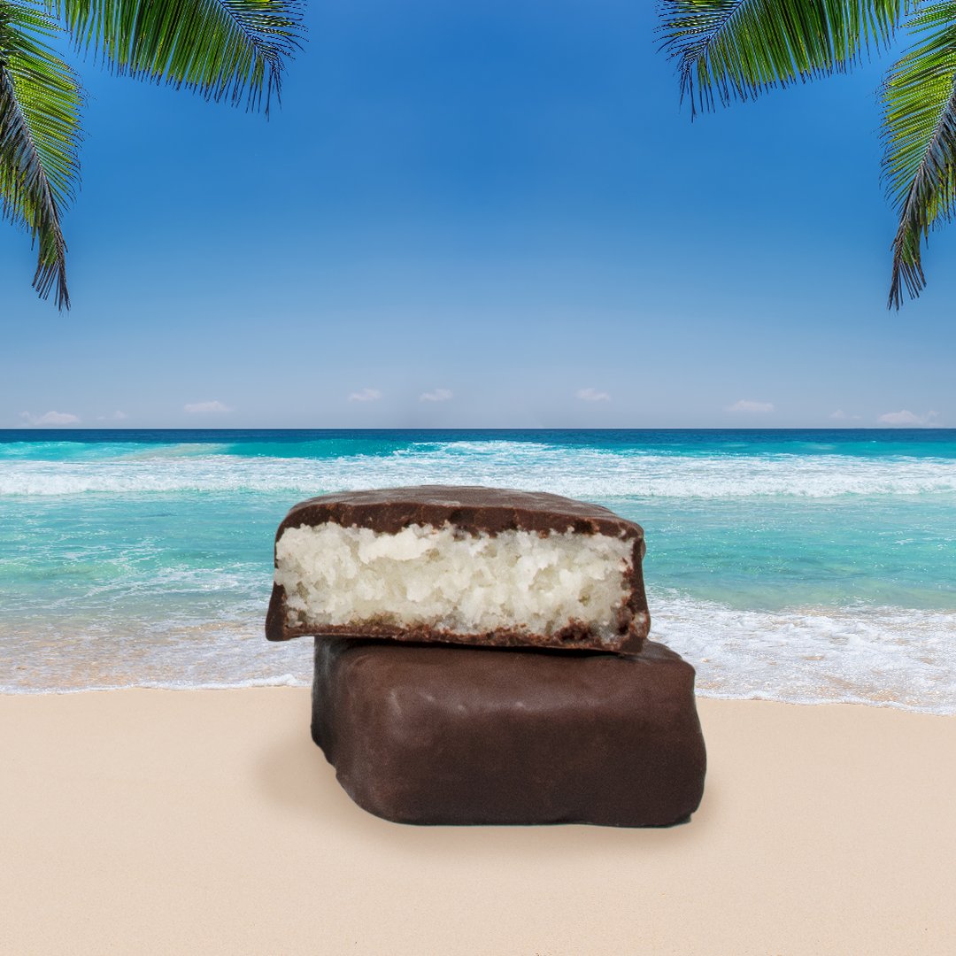 Midweek blues getting you down? When we can't actually be on the beach with a fresh coconut in hand, a bite of our Coconut Bites will transport your tastebuds there - and a relaxing background for your video calls helps. ⁠