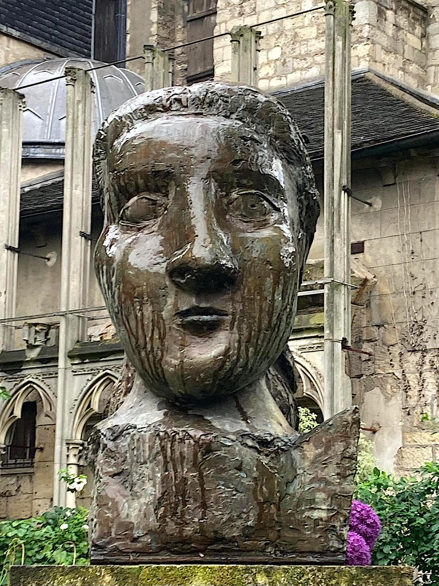 focusonparis's tweet photo. Weepy Wednesday: in the small garden of #Paris' oldest church rain pours down the face of a bust of #DoraMaar by #PabloPicasso. #art #sculpture #picasso #churchesofparis #leftbank #saintgermaindespres https://t.co/r74ejegMQi