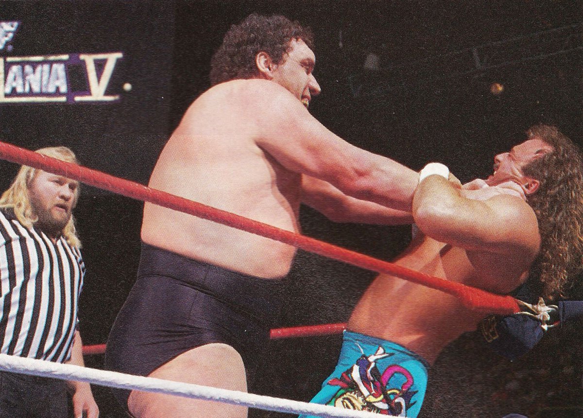 WWFWrestling1's tweet photo. WrestleMania Wednesday! Jake "The Snake" Roberts tangles with Andre the Giant with Big John Studd as guest referee at WrestleMania V. #WWF #WWE #WrestleMania #JohnStudd #AndretheGiant #JakeRoberts https://t.co/WWrqD0GA3m