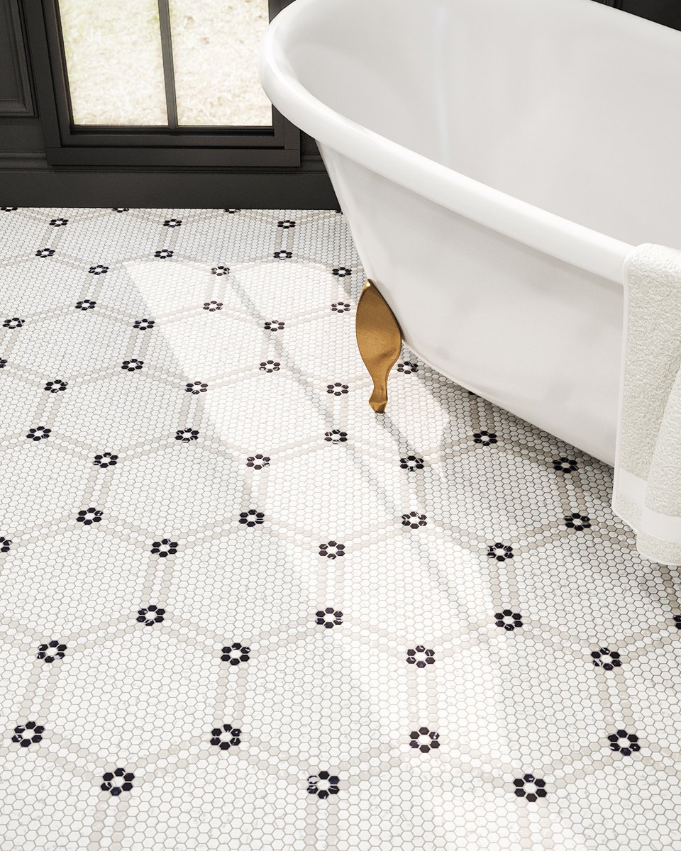 Similar to our Bulletin Mosaic, Journal Mosaic is another offering of the marbled look made from pressed and fired glass. However, unlike Bulletin Mosaic, Journal Mosaic features all three marbled colors in 5/8" mini hexagon pieces.

#JeffreyCourtInc #ThePress #BathroomMakeover