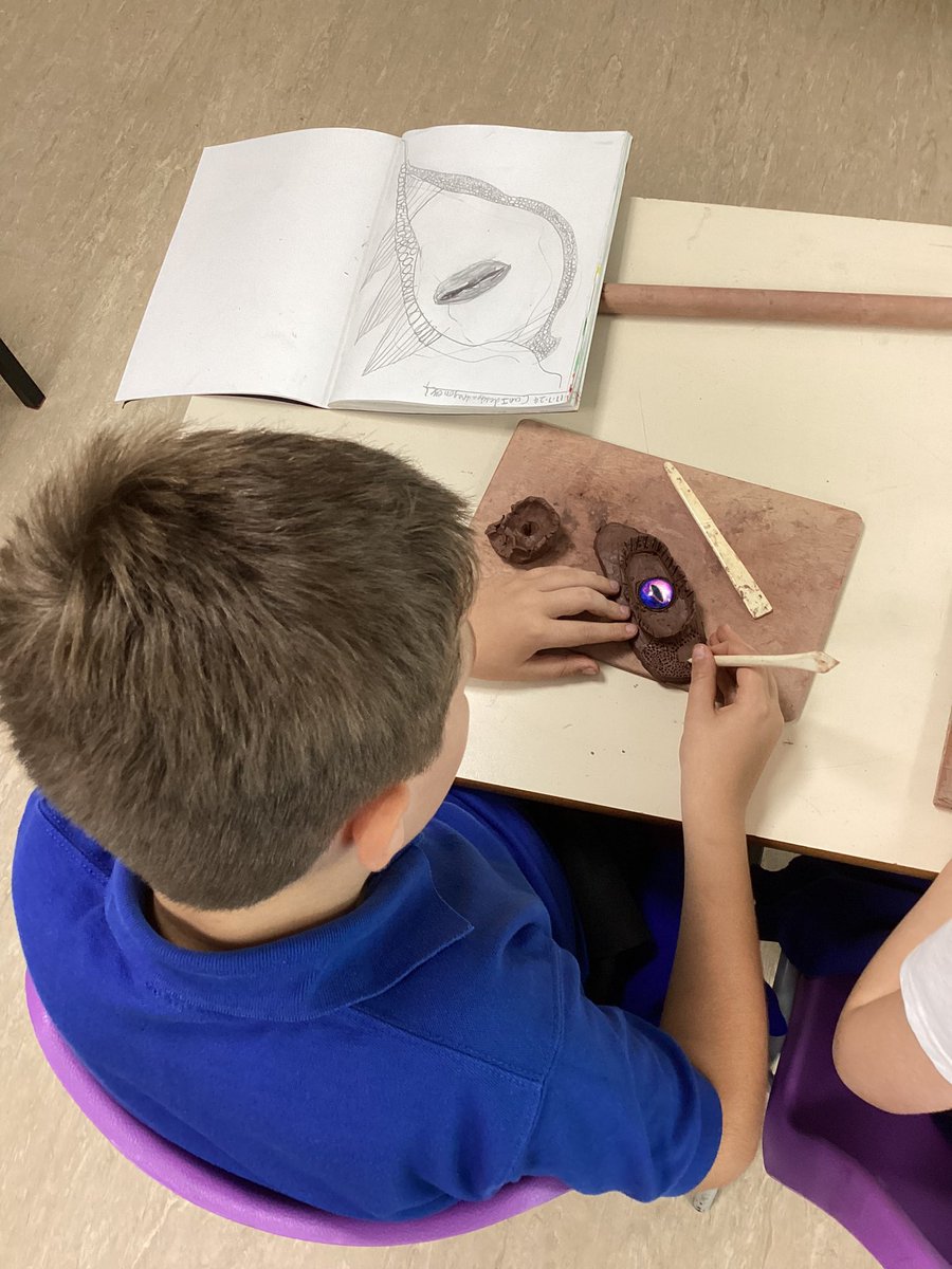 LeysFarm's tweet photo. Year 4 have enjoyed making Dragon Eyes today. Lots of design ideas linked to amphibians and other animals. Super start with modelling skills. #LFJSArt https://t.co/9guZq9U5Tj