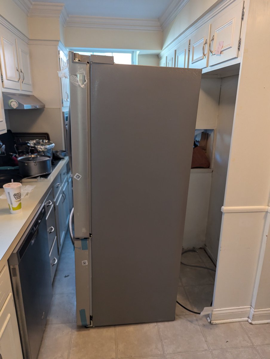 mjlambie's tweet photo. Oh @HomeDepot , how I've loved you my whole life. But ordering appliances from you has been so challenging. Our memorial Day fridge purchase. Just delivered the replacement, after a leak to the basement, and a faulty first installation. The crew just ghosted us with this. Ugh. https://t.co/vjUHrsFeZG