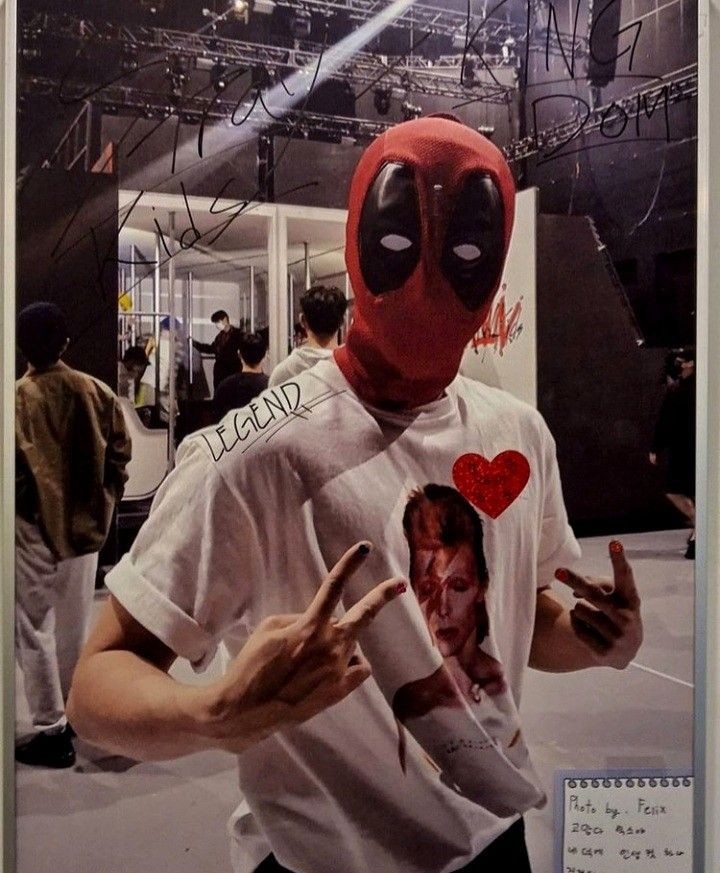 hangallery_'s tweet photo. Han Jisung in a deadpool mask https://t.co/TKP7Sv1rZg