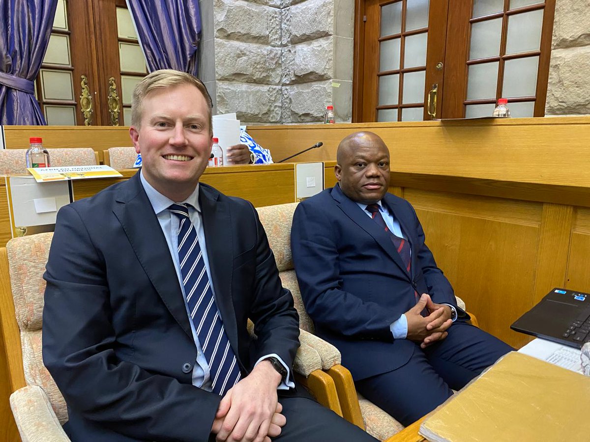 ProfJNMoyo's tweet photo. CUTTING A SORRY FIGURE: from minister in June to deputy minister in July in the same portfolio. 

It's staggering and incomprehensible how or why the ANC's former KwaZulu-Natal Premier who was also the party's chairperson in the province before becoming Minister of Public Works and Infrastructure from March 2023 to June 2024; Sihle Zikalala - who has a BA in Communication Science and a Masters in Commerce - was appointed, in fact demoted, to deputy minister under Dean MacPherson; a Matriculant deployed to the 'GNU' by the white-led DA, who is the new Minister of Public Works and Infrastructure.

Was Zikalala's demotion from minister to deputy minister, in the same portfolio, an ugly and humiliating expression of patronage to enable him to pay his bills; or was it a strategic deployment worth the humiliation? 

His miserable and painful look on the picture, with his boss, suggests the former!