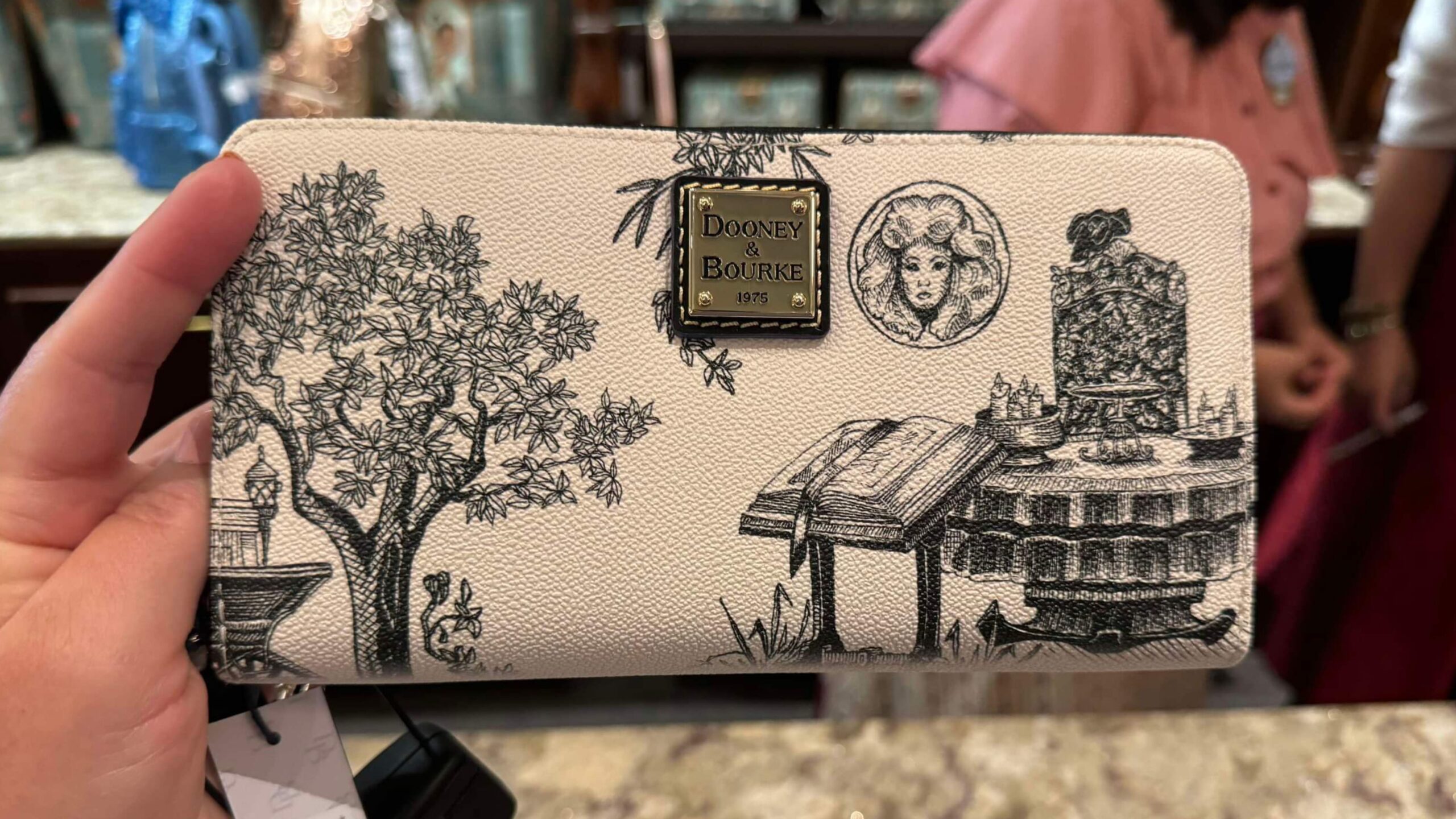 Chip and Company on X A Spooktacular Addition The Haunted Mansion Dooney and Bourke Wallet Arrives at Magic Kingdom https t PPe2npYwTg https t UnzZlNig6m X