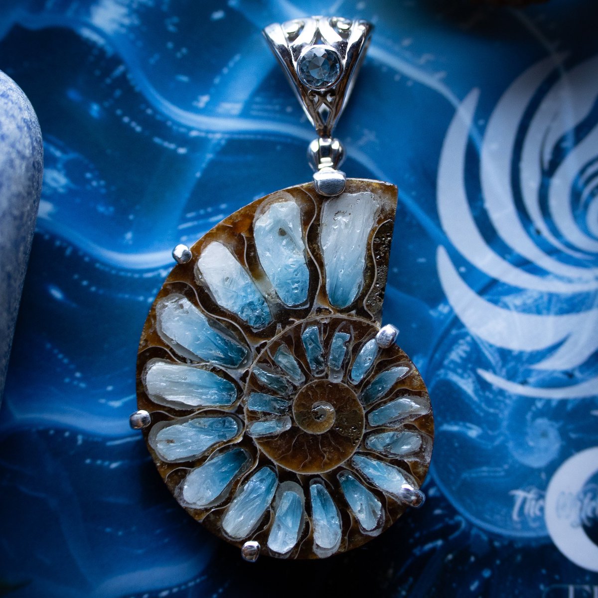 thewitchesmoon_'s tweet photo. We are thrilled to include a limited number of our Sacred Spiral Pendants to our Moon Market! These beautiful creations are made from Ammonite, Blue Ice Glacierite, and Blue Topaz! https://t.co/sxd6KJYugP