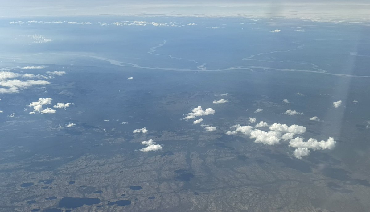 tephrafan's tweet image. I am an expert at poor quality landscape photography from commercial flights. A few shots from Yellowknife (very smoky), Dehcho (Mackenzie) south of Tulit’a looking toward the Redstone (sharp bend joining Dehcho), and view of Tulit’a down the Great Bear River in the #Sahtu