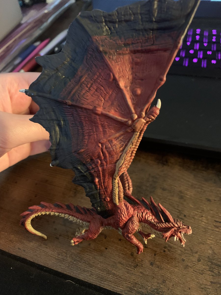 ErinMarczewski's tweet photo. Going through an old box and found some little dragon figures I must have gotten somewhere cause I just liked dragons, and turns out they were fully painted D&amp;D minis of a bronze and red dragon!!! https://t.co/lENx4kgKHr