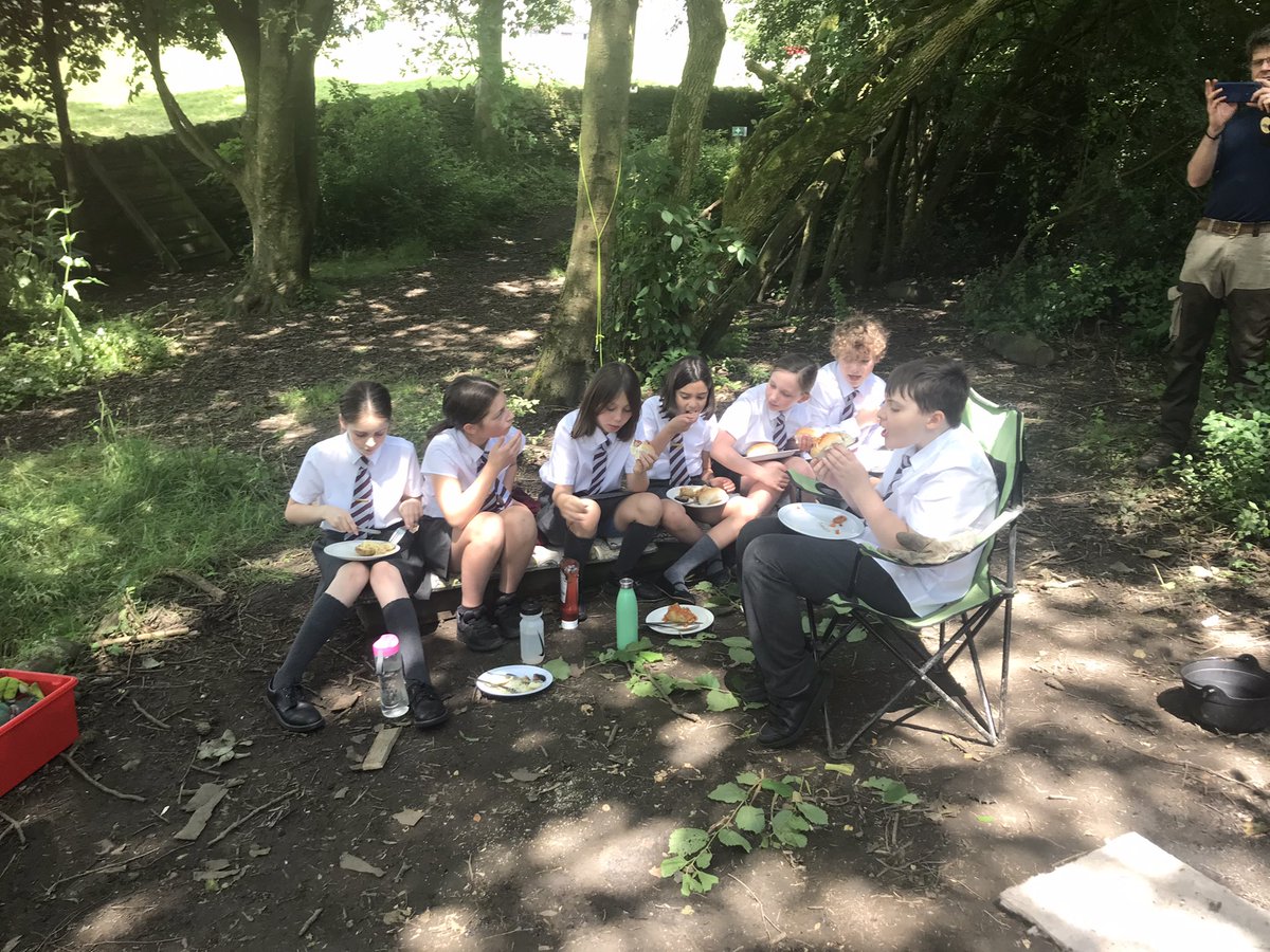 MidgleySchool's tweet photo. Thank you to Mr Vickers for the best leavers��� lunch for our Year 6 pupils down in Forest School. Jacket potato, sausages, beans,  cheese and even halloumi on the menu. Year 6 said it was the best dinner ever  😋 https://t.co/dMlVezo3RG