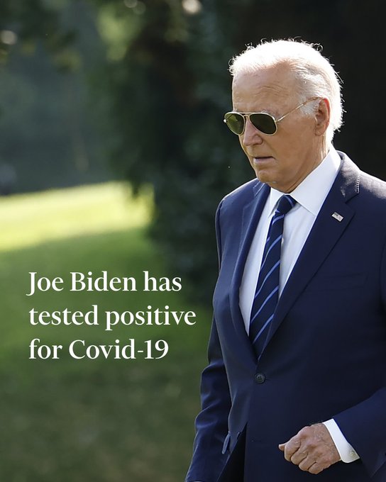 Close-up of Joe Biden. Overlaid text reads: Joe Biden has tested positive for Covid-19