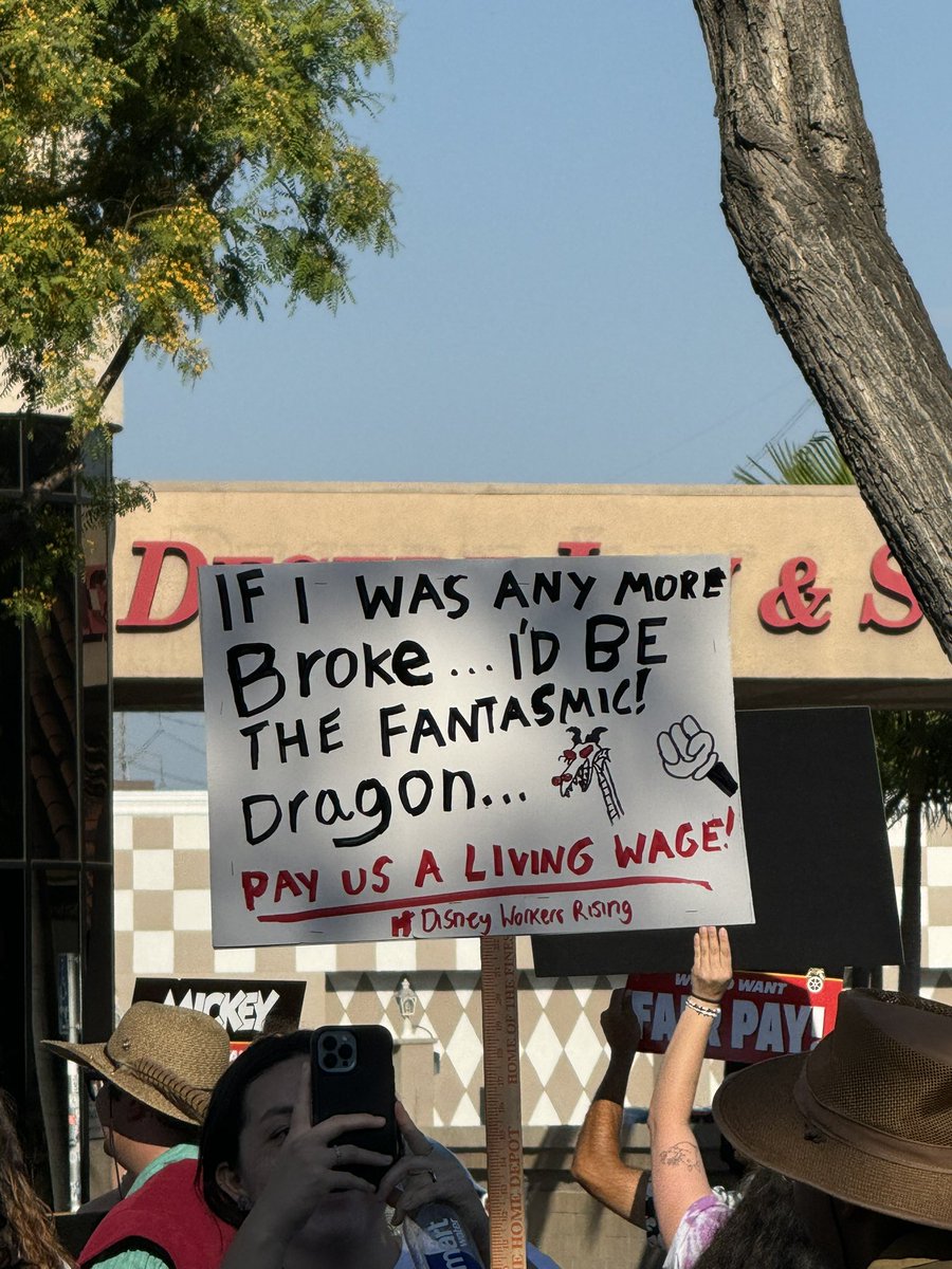 DisneyScoopGuy's tweet photo. My favorite signs from the cast members protesting for better wages outside Disneyland on Harbor Blvd! https://t.co/n3ofDYIcPL