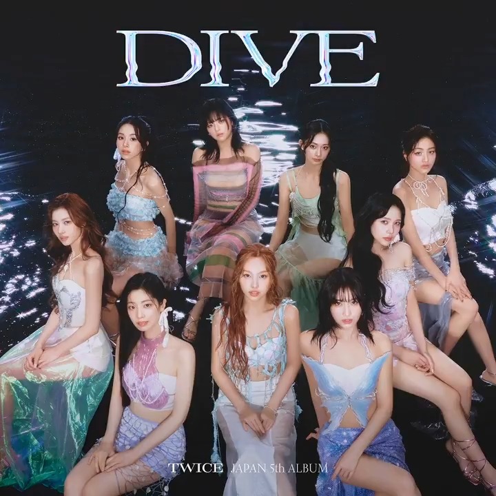 Promotional image for 'TWICE JAPAN 5th ALBUM' titled 'DIVE', showing the nine members of the K-pop group in pastel and iridescent outfits against a dark water background.
