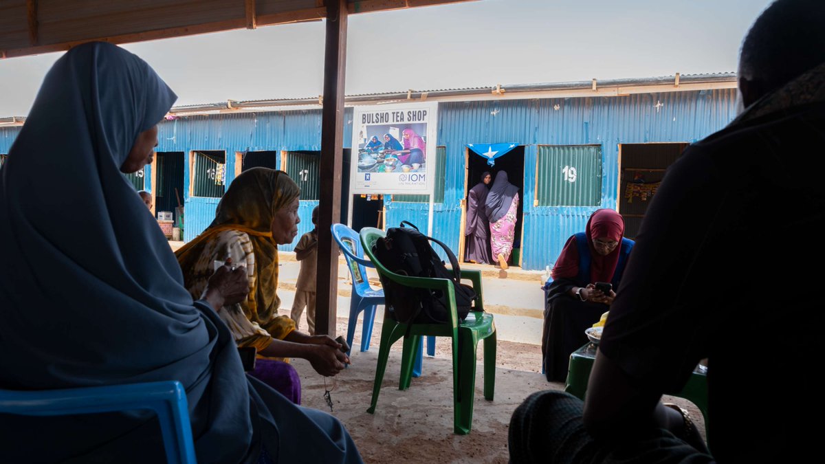 "This tea shop isn't just my livelihood. It’s a place for neighbors to chat, share stories and connect. It is the heart of our [community]."

Habiba runs a business at the Ladan Camp Women's Market, built by IOM.

🙏 <a href="/NorwayInSomalia/">Norway in Somalia</a> and the Greta Thunberg Foundation