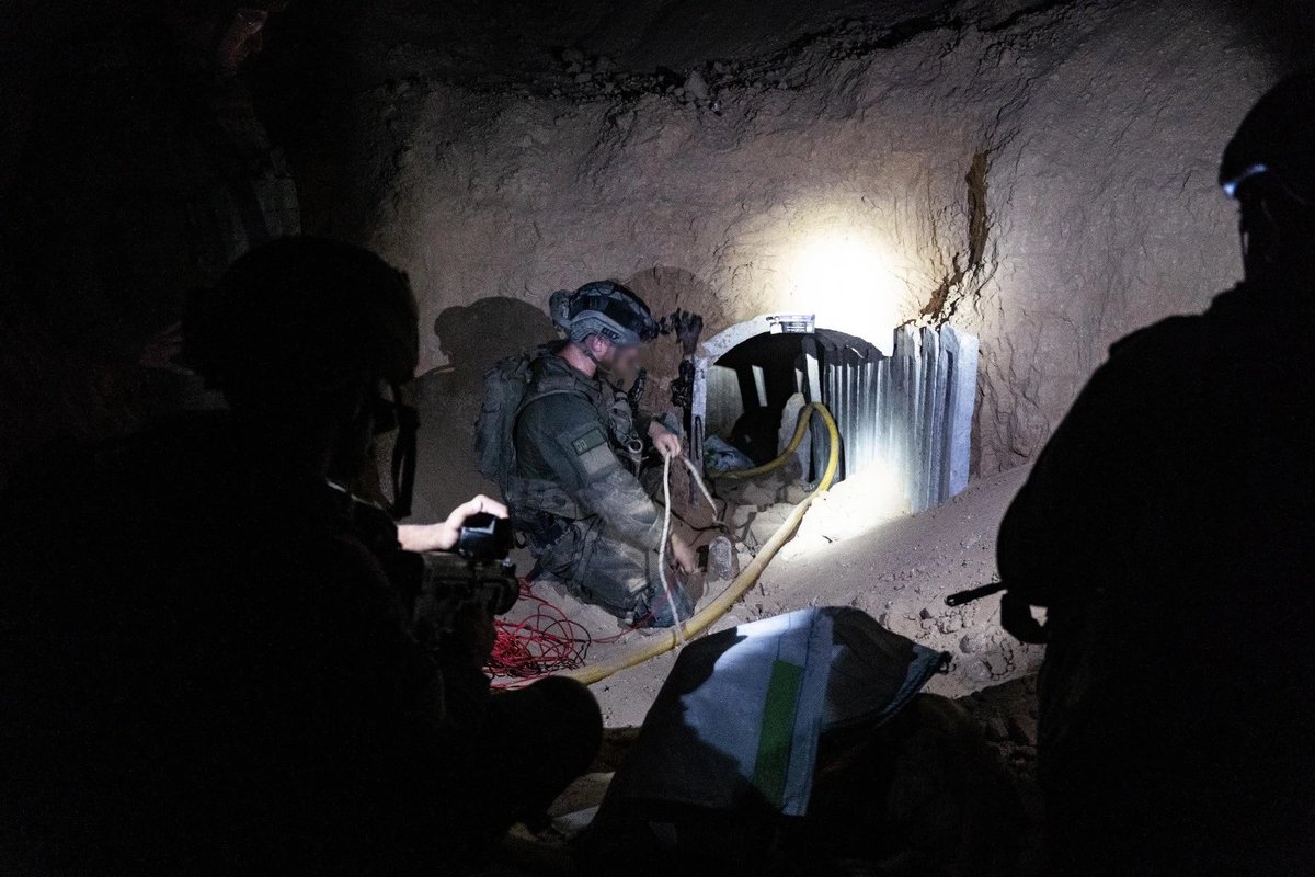 IDFsoldiergirl's tweet photo. Below, #IDFtroops are wiring the tunnel for demolition. The tunnel route is part of another tunnel about 3 kilometers long that was destroyed by our forces in the past. Along the tunnel route, branches, side doors, living space & electrical infrastructure that were used by #Hamas were found & destroyed. #Israel #Gaza #IDF #IDFHeroes #BringThemHomeNow #NeverAgainIsNow