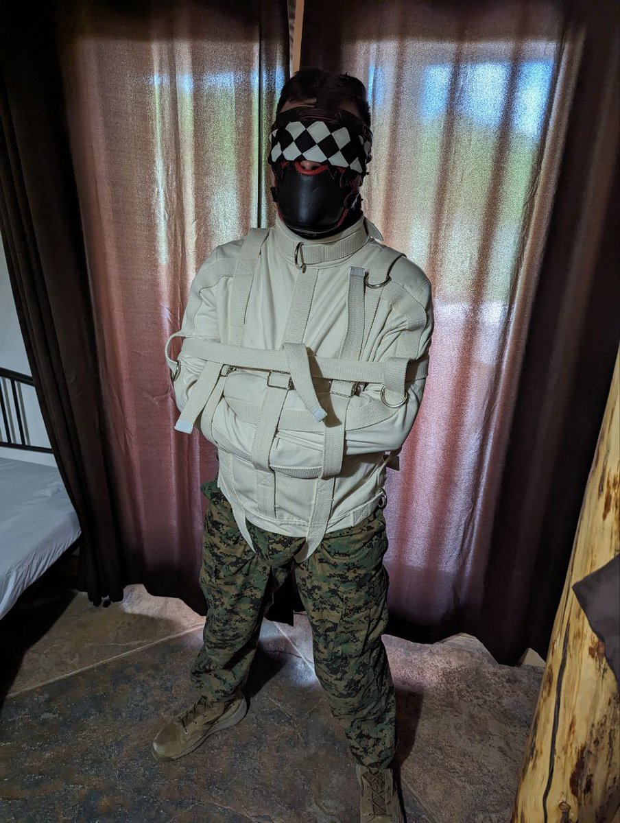 ThatBondageguy's tweet photo. And finally the last of my pictures from #CampKnotty2024 :

I asked @ColoradoBondage if I could go for a ride in his straightjacket and try out his really nice muzzle. He was happy to oblige. Of course @tieguywyo decided to have some fun with me once I was brought up stairs. https://t.co/oLiqgFKBHn
