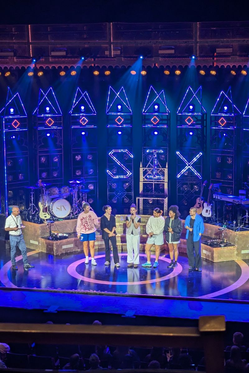 TheIslandVIForm's tweet photo. 30 of our drama students attended an amazing performance of Six at the Mayflower Theatre in Southampton yesterday. Not only did they get to see the show, they had a live tech demo and a Q&amp;A with the Queens themselves! 
Read a full trip report here: https://t.co/sdhqHsC637 https://t.co/4GvRJxwvhu