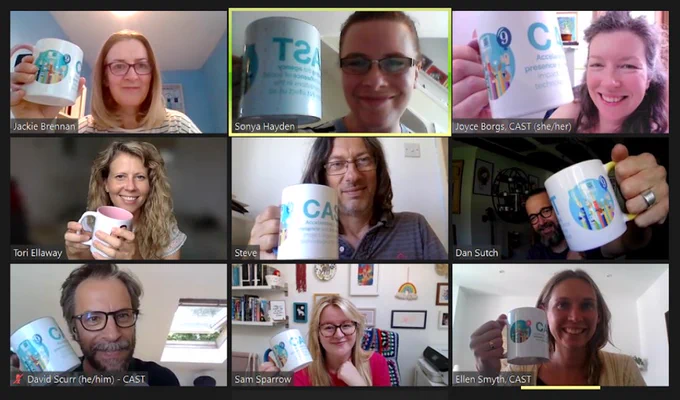 A screengrab of a CAST Zoom call, showing all nine CAST staff (six women and three men) holding CAST '9th anniversary' mugs.