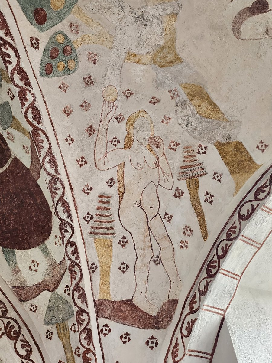 ThomasSmaberg's tweet photo. Eve and Adam in the garden of Eden and the serpent/devil is handing her the forbidden fruit. Wallpainting from the 15th c in #Fulltofta church in Skåne, Sweden. Notice the bellybutton on Eve... https://t.co/mx2Lxo7Rxd
