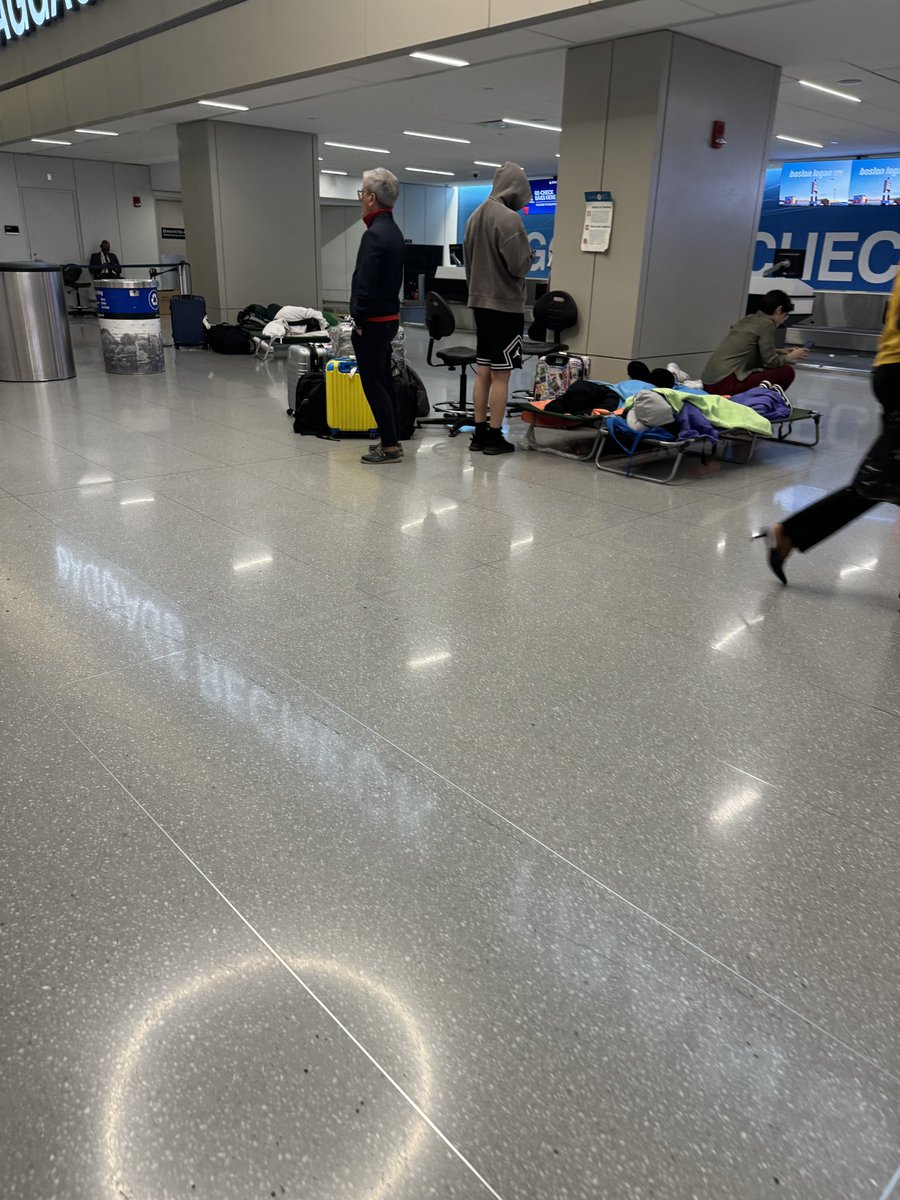 @ Boston airport since 1:00am being rerouted from EWR b/c of weather, sitting on the plane for 2 hours told we were going to reroute to Newark while refueling the crew timed out. We were told we’d get hotels &amp;help once we got our luggage &amp; nothing <a href="/tapairportugal/">Claim Department Tap Air Portugal</a> now on a bus