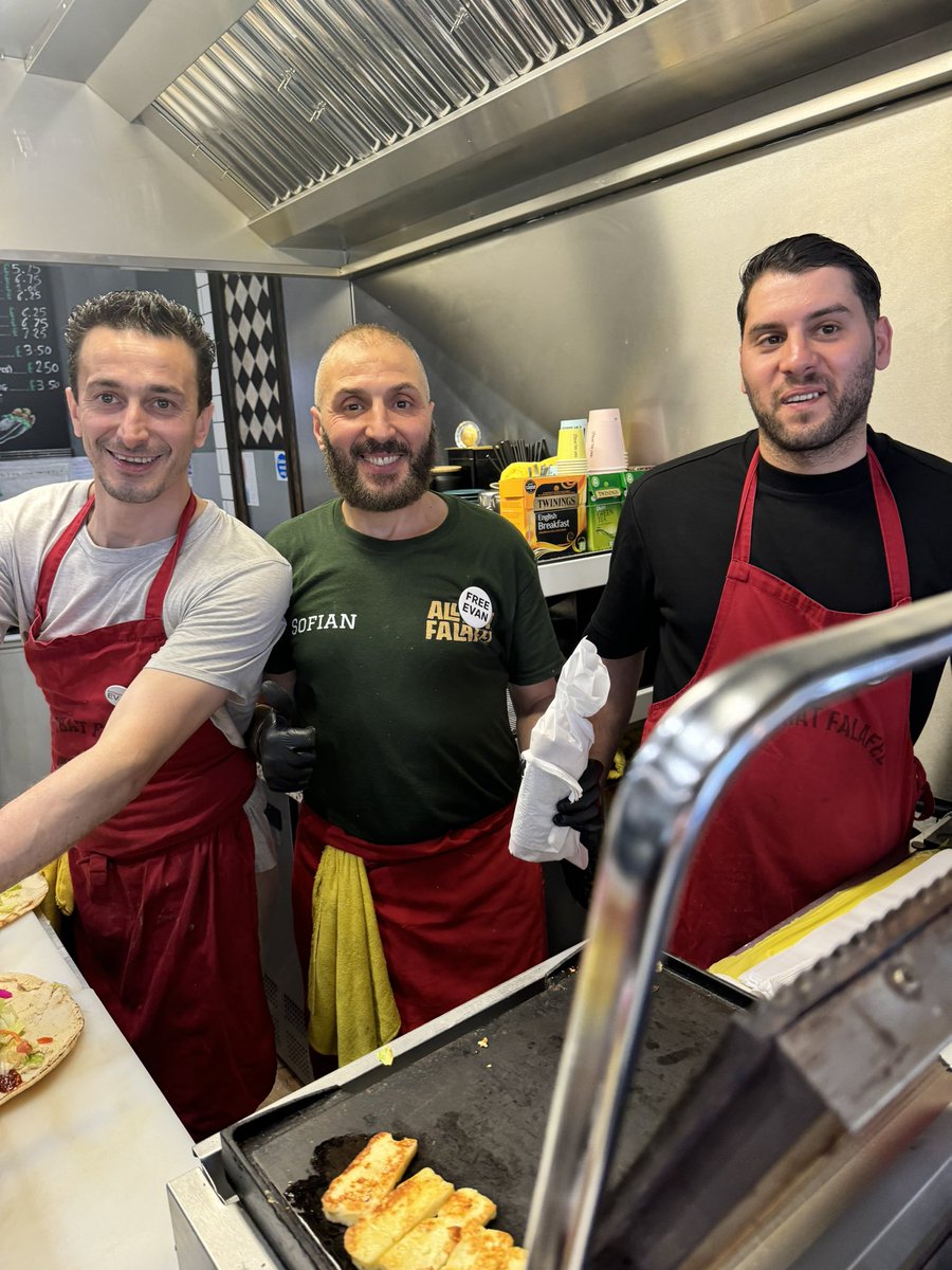 grainnemcc's tweet photo. From the Evan burger to the Evan falafel, we continue to stand with our brilliant colleague in every way possible. Thank you Sofian and everyone at All That Falafel for standing so fiercely with him too. We can’t wait for Evan to have one. #IStandWithEvan #CookForEvan @WSJ https://t.co/QnCn6fB1Rc