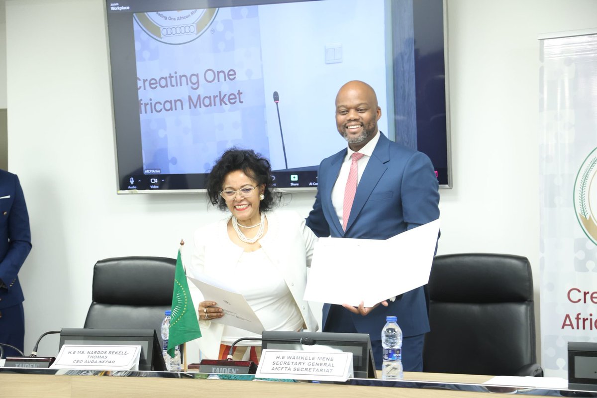 AfCFTA's tweet photo. The #AfCFTA and @NEPAD_Agency signed a Letter of Agreement (LoA), in Accra, Ghana. The LoA aims to deepen the collaboration between the 2 institutions in their work with stakeholders to foster acceleration in the implementation of the AfCFTA.1/2 https://t.co/O5ClnpXubk