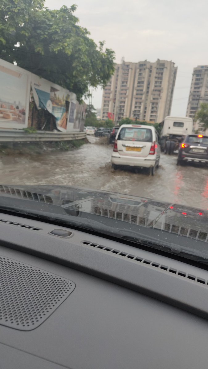 Road flooded with rain water in front of Migsun society in Raj Nagar Extn due to drainage blocked by Migsun. Already complaint to <a href="/gdagzb/">GDA Ghaziabad</a> <a href="/AMRUTCityGzb/">Ghaziabad Nagar Nigam</a> but no action taken. Is anyone listening <a href="/DmGhaziabad/">Dm Ghaziabad</a> <a href="/myogiadityanath/">Yogi Adityanath</a> <a href="/myogioffice/">Yogi Adityanath Office</a>