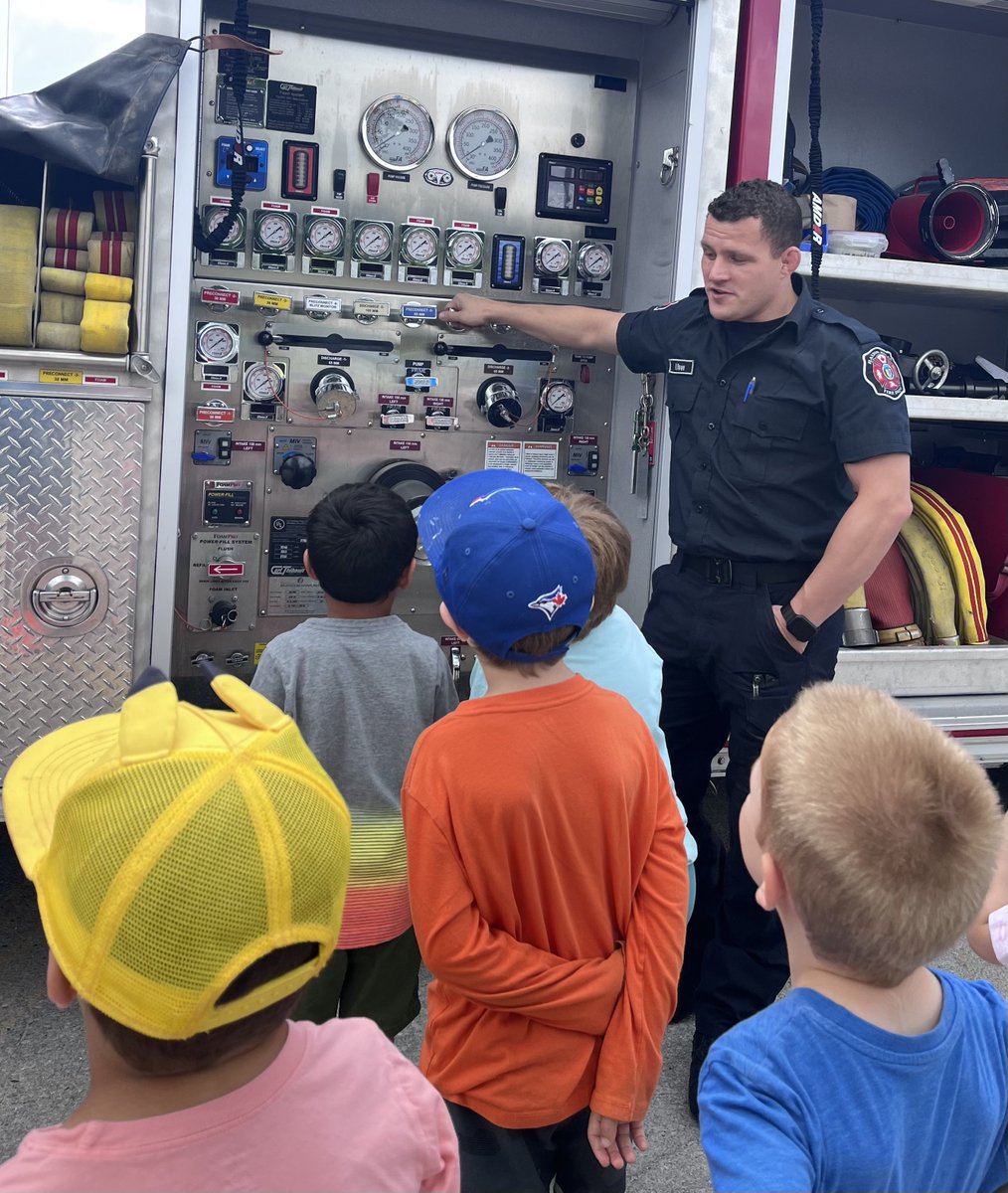 Firefighter Rowe showing <a href="/_HaltonHills/">Town of Halton Hills</a> campers P721’s pump panel.