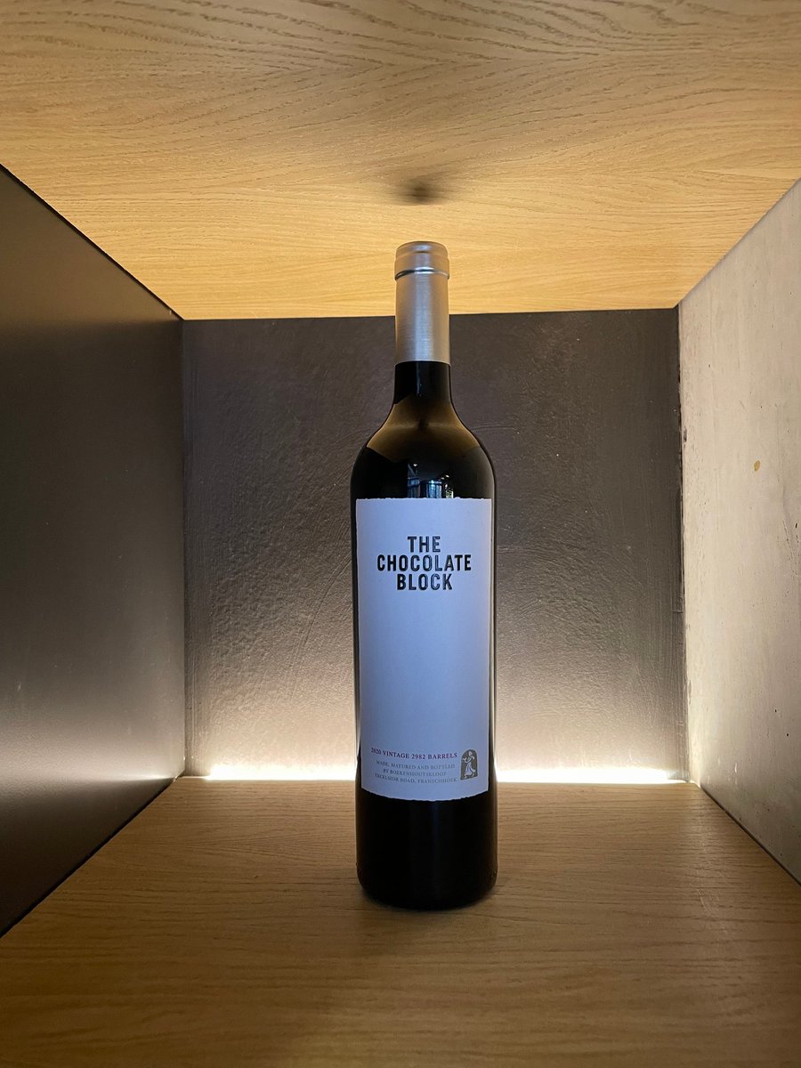 WolfysBar's tweet photo. Indulge in the bold and bestselling flavor of The Chocolate Block at Wolfy's Bar! Made with Boekenhoutskloof Syrah, Grenache, Cinsault, Cabernet Sauvignon, and Viognier. #wine #chocolateblock #delicious https://t.co/psWA65EApe https://t.co/gZaL4oZZBF