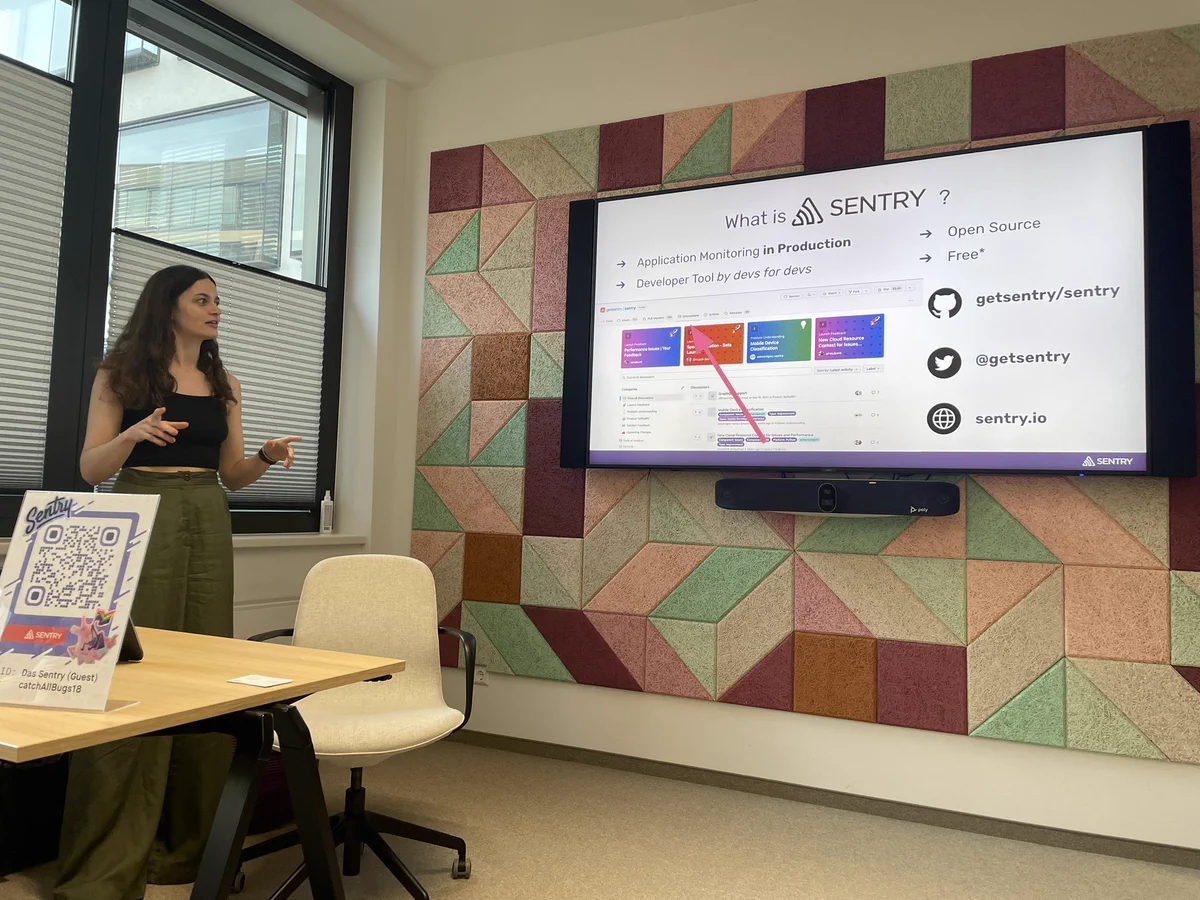 Sigrid on stage presenting about sentry