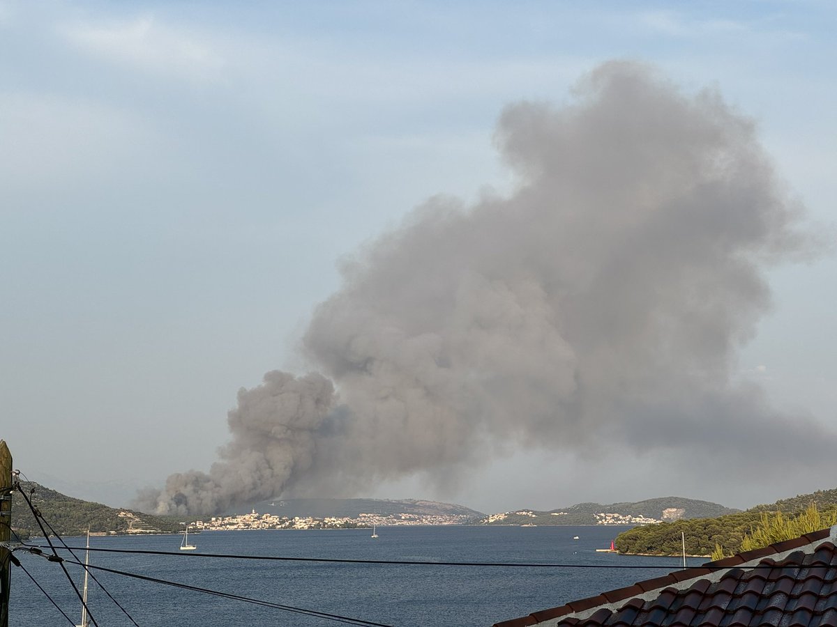 Smoke looming over Seget Vranjica and Seget Donji, Croatia