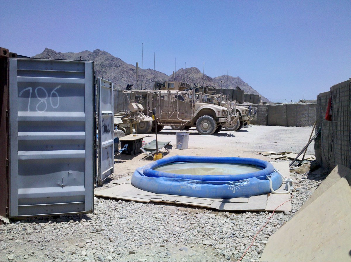 If you're a veteran and deployed somewhere hot and had the luxury to get/make/use a pool, post a picture.  I'll start.   Arghandab District, Zabul Province, Afghanistan.  May or June 2011.  Water was from the Arghandab river and was allegedly 10% human waste.