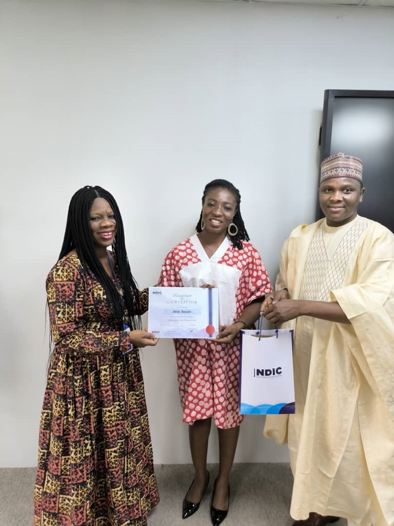 ndic_academy's tweet photo. The Director/CLO Academy, Mrs. Oluwanishola E. Rosemary, alongside Head, Program Delivery Unit, Dr. Sani Saidu, handing certificates of participation to participants from the Ghana Deposit Protection Corporation (GDPC)
#NDIC #NDICAcademy #DIS #GDPC https://t.co/ebjHveLzcb