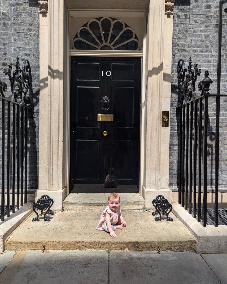 Not sure I'll ever tire of this photo. My baby, sitting on the steps of number 10.  You tell them Ada