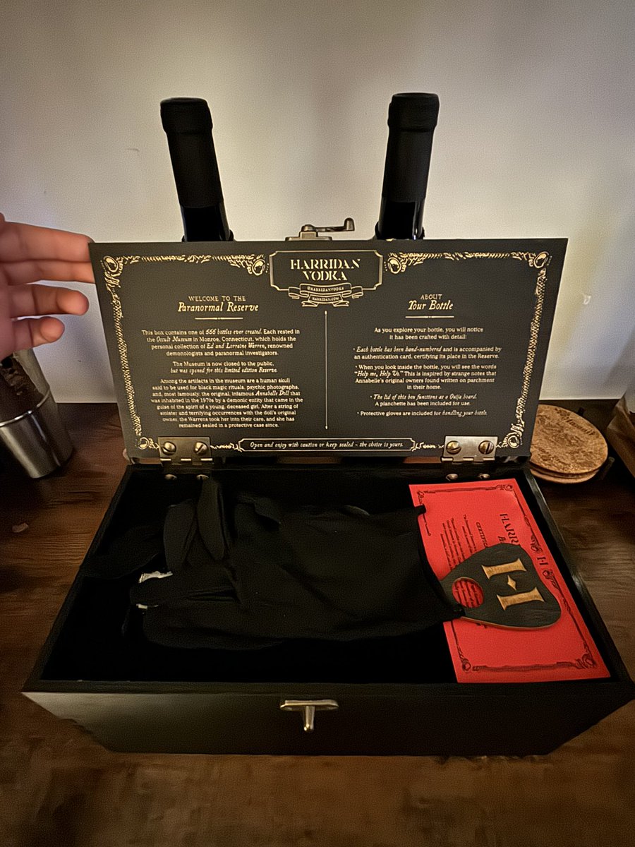 thank you to my friend for one of the coolest gifts I’ve ever gotten - <a href="/HarridanVodka/">Harridan Vodka</a> created a batch of vodka that was stored in the infamous Warren’s Museum right next to the Annabelle case 👻 housed inside a box that functions as a ouija board with gloves for safe handling 😈