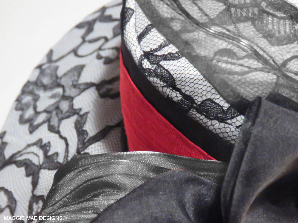 MMaeDesigns's tweet image. There's just something about a black and white chapeau with a splash of red to make it truly sing! Explore the magic of couture millinery with a hat created especially for you by MAGGIE MAE DESIGNS...  &amp;lt;3    maggiemae.com #couturemillinery #customhats #kentuckyderbyhats