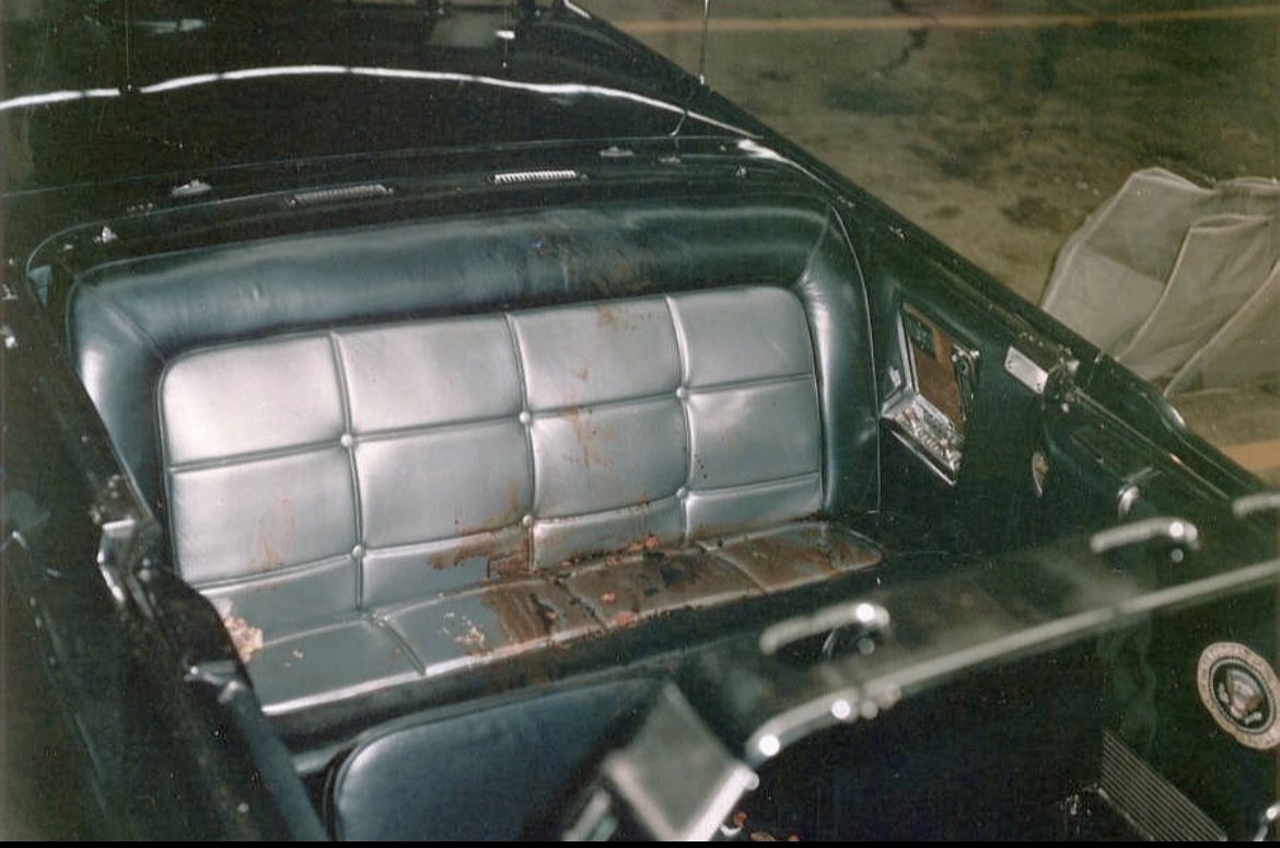 MorbidKnowledge's tweet image. The rear seat of JFK's limousine right after the assassination, 1963.