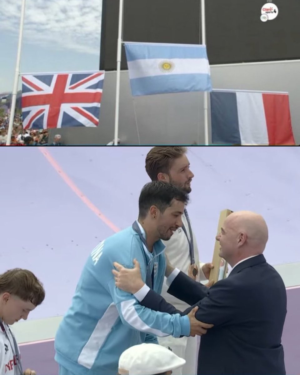 La bandera de Argentina en lo más alto y Gianni Infantino, Presidente de FIFA, dándole la Medalla de Oro de BMX Freestyle al Maligno Torres.

MOMENTAZO. 🇦🇷🥹